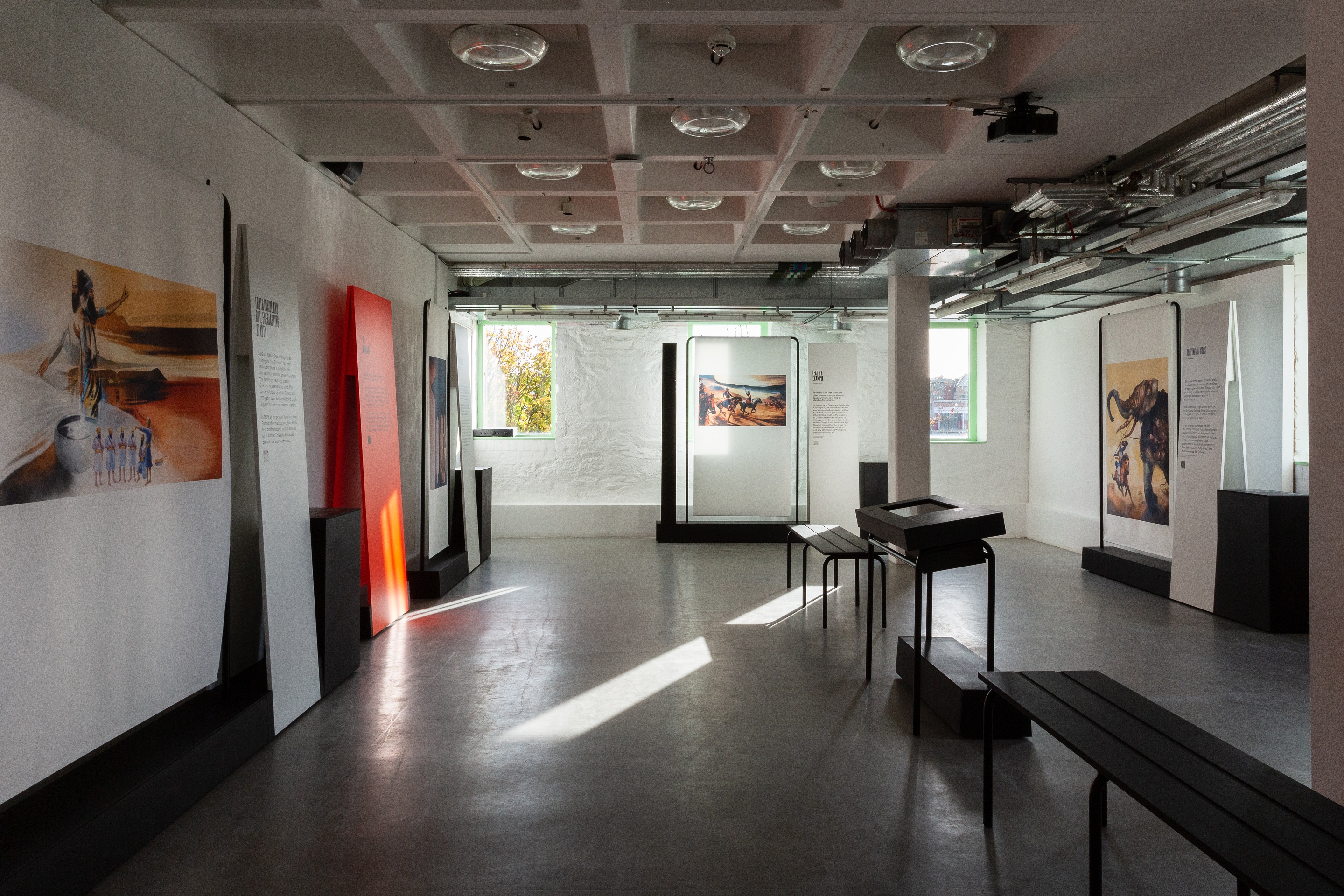 A colour photograph of a gallery space featuring works for the Journey of the Mind exhibition..
