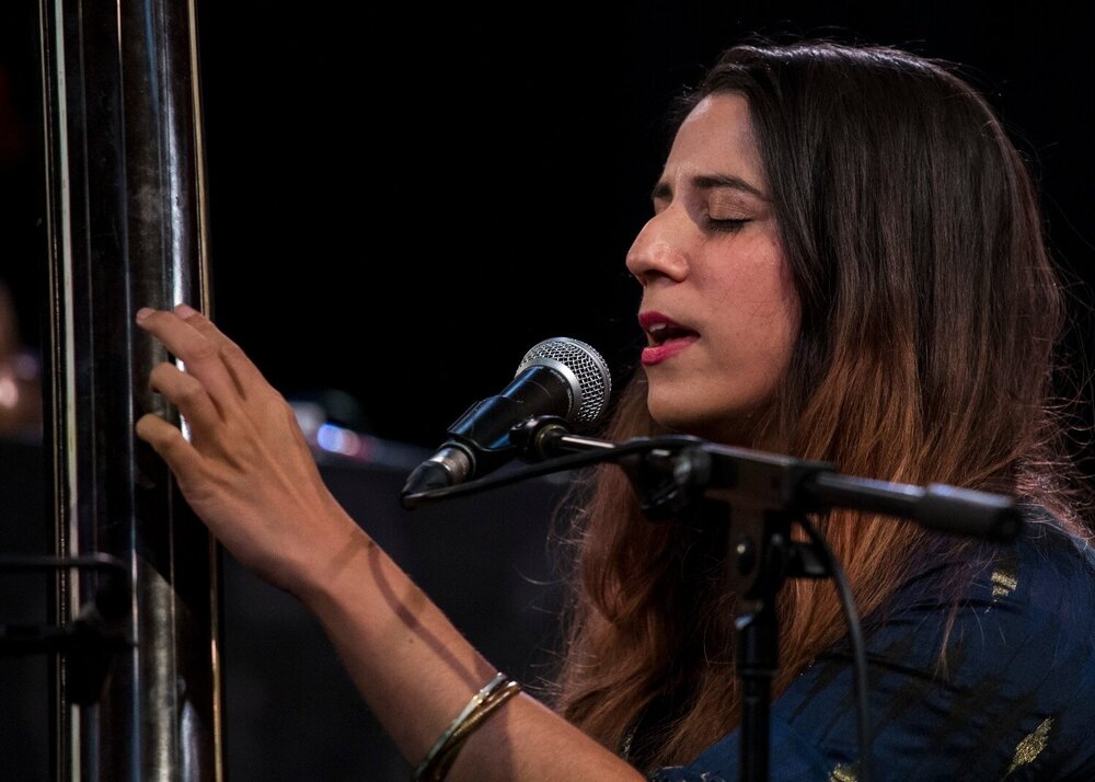 a colour photograph of artist Ranjana Ghatak performing