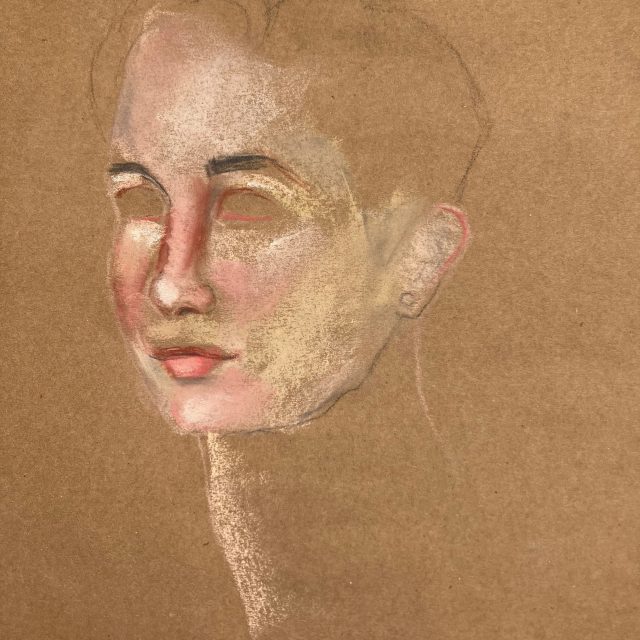 pastel drawing of a portrait on brown paper